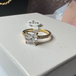 Elegant Gold Ring with Clear Stone